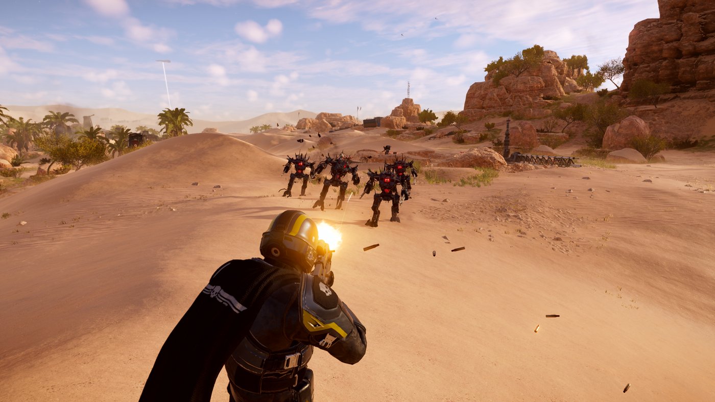Official Helldivers 2 still from the 7.1.0 notes — squad holding a defensive line under heavy enemy pressure