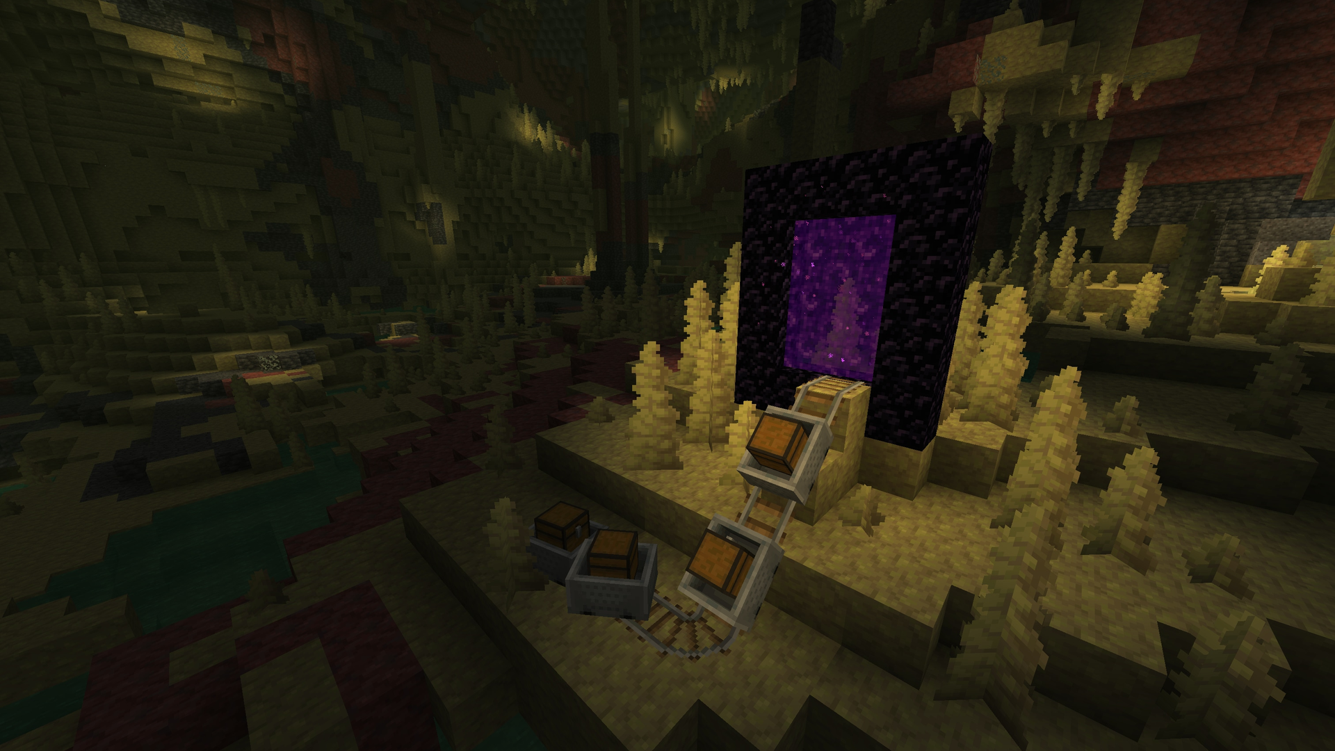 Official Minecraft still — chest minecarts on rails rolling toward a Nether portal inside a yellow-green Sulfur Cave lined with sulfur spikes