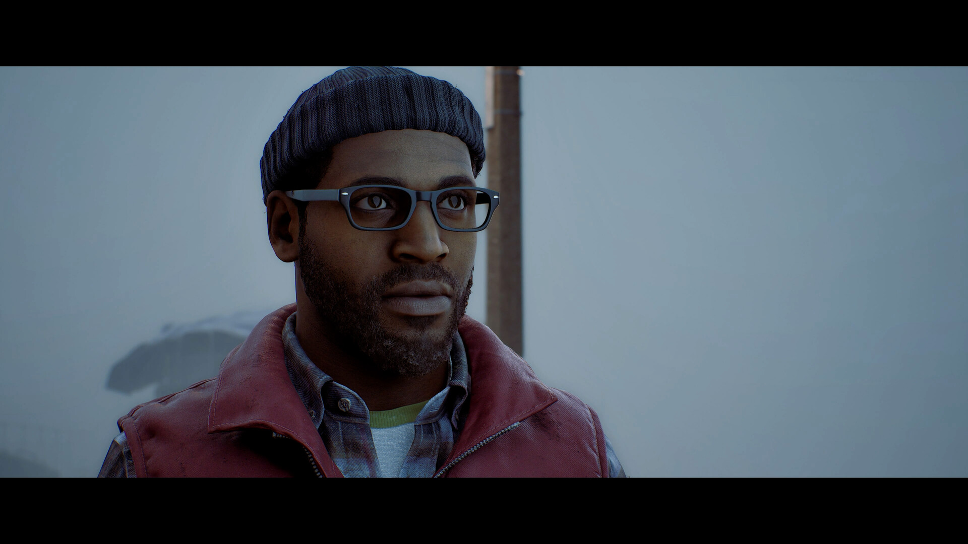 Official SILENT HILL: Townfall Steam still — Simon Ordell in beanie, glasses, and red vest against fog